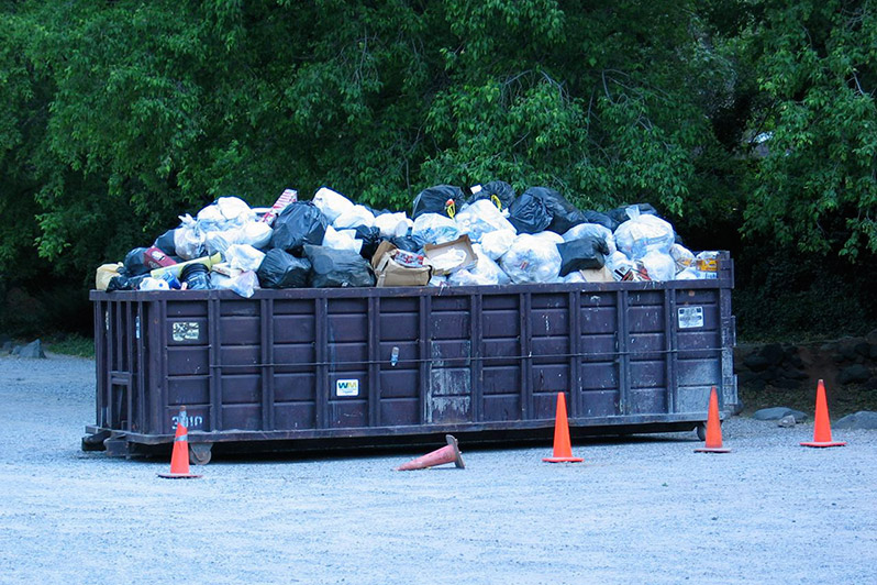 Keep Oak Creek Canyon Beautiful projet - dumpster overflowing with bags of trash collected in the Canyon